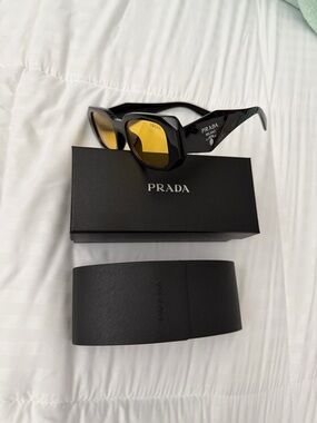 Prada Black Frame Sunglasses with Yellow Lenses